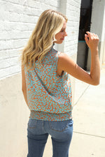 Dazzle In Teal Smocked High Neck Animal Print Sleeveless Top