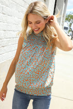 Dazzle In Teal Smocked High Neck Animal Print Sleeveless Top
