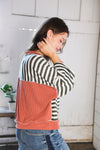 A Stripe Story Rust Crew Neck Pullover