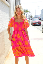 Beautiful You Coral Floral & Border Print Smocked Dress
