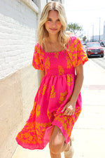 Beautiful You Coral Floral & Border Print Smocked Dress
