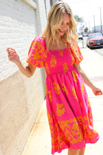 Beautiful You Coral Floral & Border Print Smocked Dress