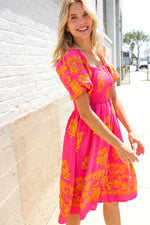 Beautiful You Coral Floral & Border Print Smocked Dress