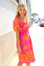 Beautiful You Coral Floral & Border Print Smocked Dress