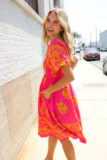 Beautiful You Coral Floral & Border Print Smocked Dress