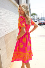 Beautiful You Coral Floral & Border Print Smocked Dress