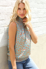 Dazzle In Teal Smocked High Neck Animal Print Sleeveless Top